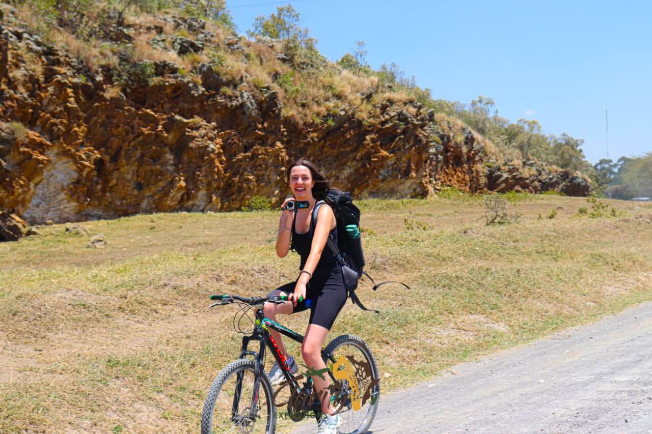 Cycling past ancient rock formations on a trail adventure